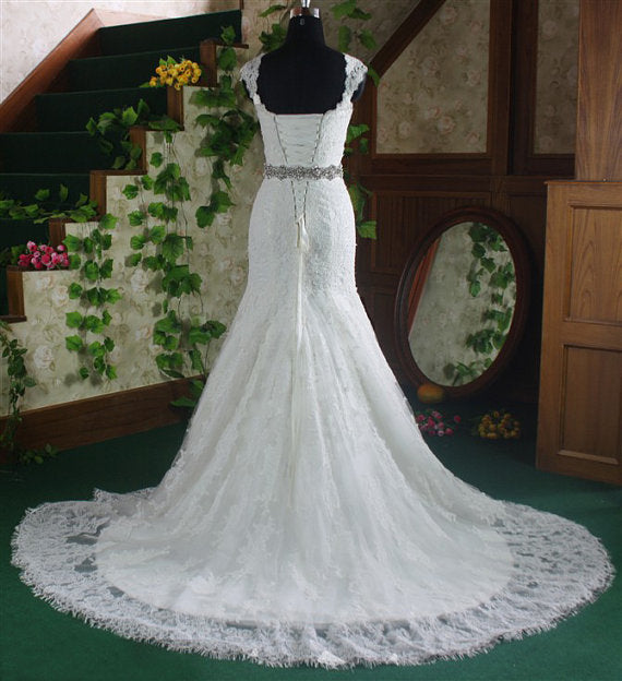 Glamorous Luxury Mermaid White Lace Wedding Dress with Cathedral Train and Pearl Embellishments